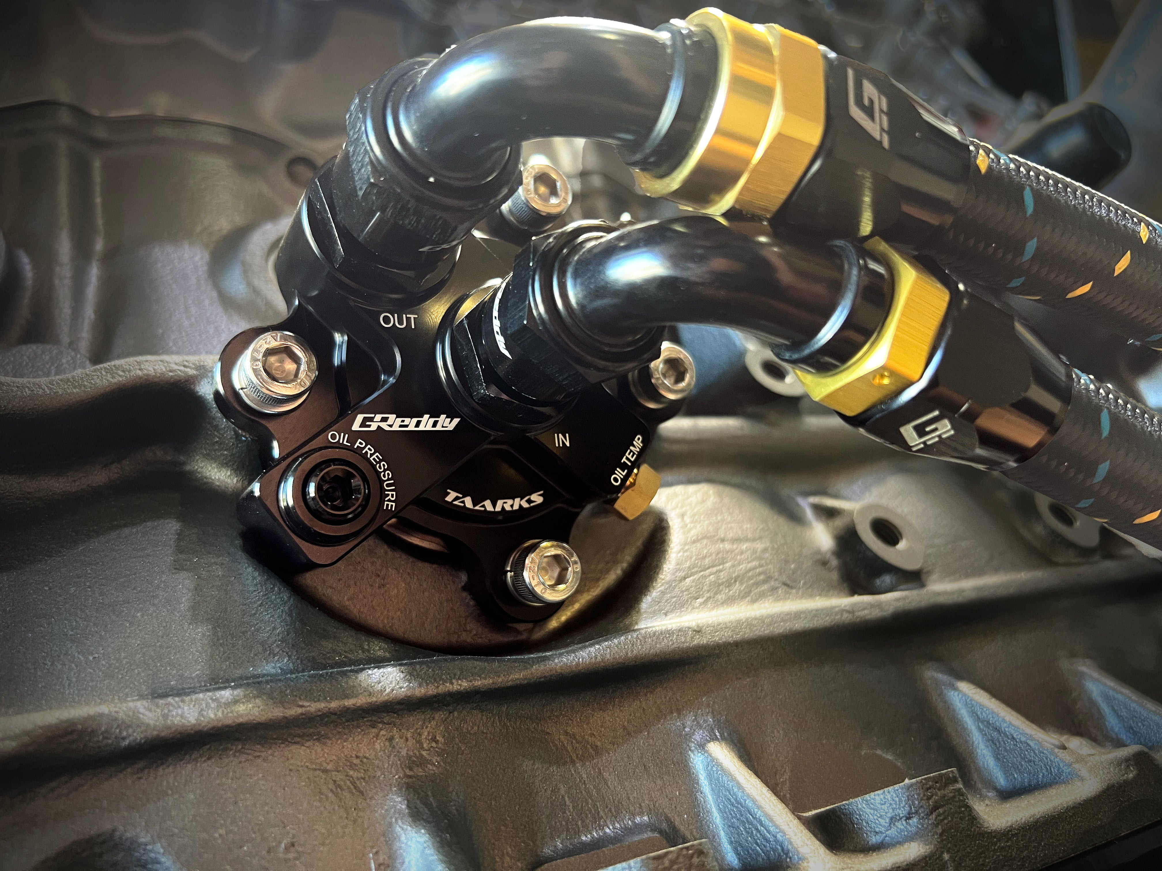 GREDDY X TAARKS RB26 BOLT-ON OIL BLOCK ADAPTER, 10AN - (12428100)