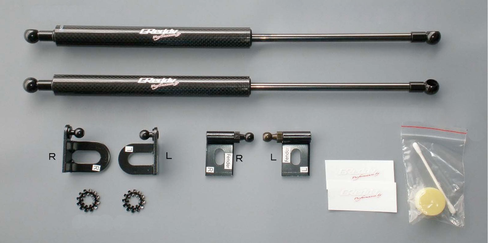 GReddy Carbon Hood Damper(s)