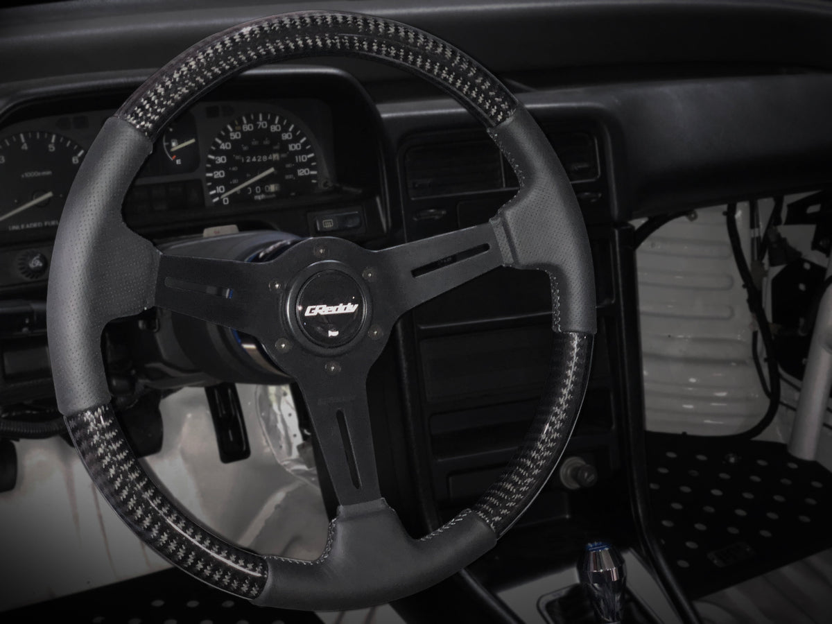 G Reddy Wheel GREDDY SPORT STEERING WHEEL - CARBON LEATHER MED DISH - (16600007)
