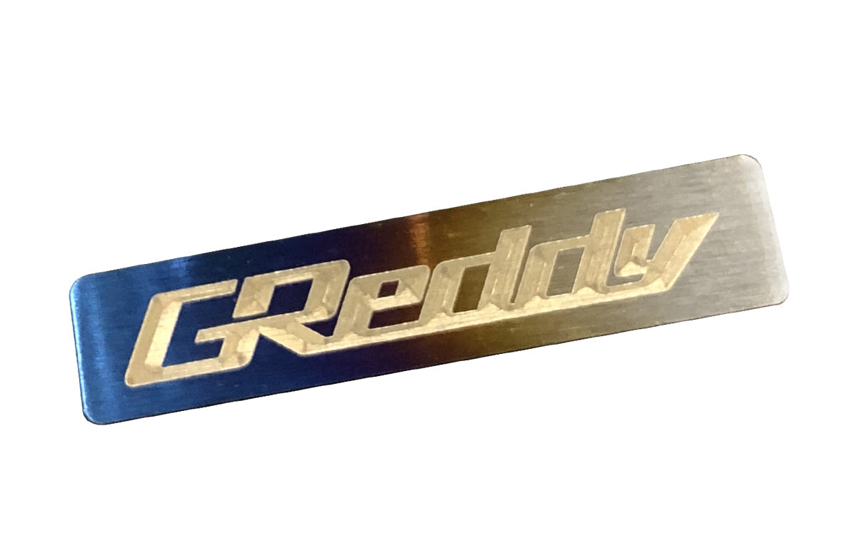 Titanium GReddy Emblem - (70x15mm)