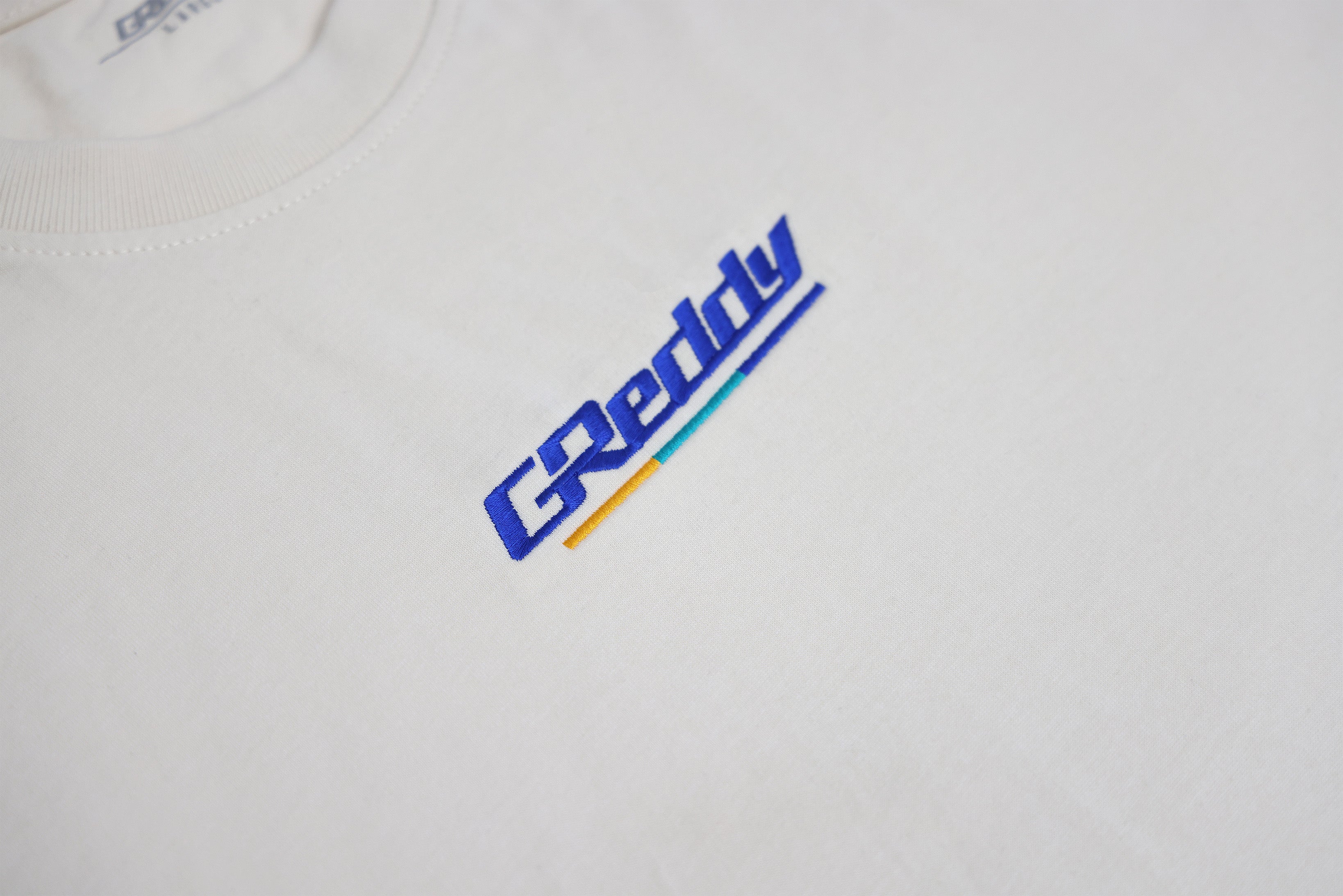 GReddy Underline Embroidered Tee – Cream